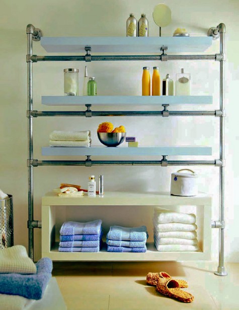 Ikea Lack shelves and galvanized pipes and fittings turned into a stylish and chic shelving unit for a large bathroom