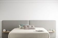 17 a modern grey upholstered headboard with floating nightstands attached is a laconic and stylish solution