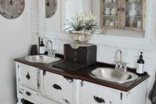 17 a shabby chic vanity space with adorable vintage pendant lamps over the vanity that add a refined touch