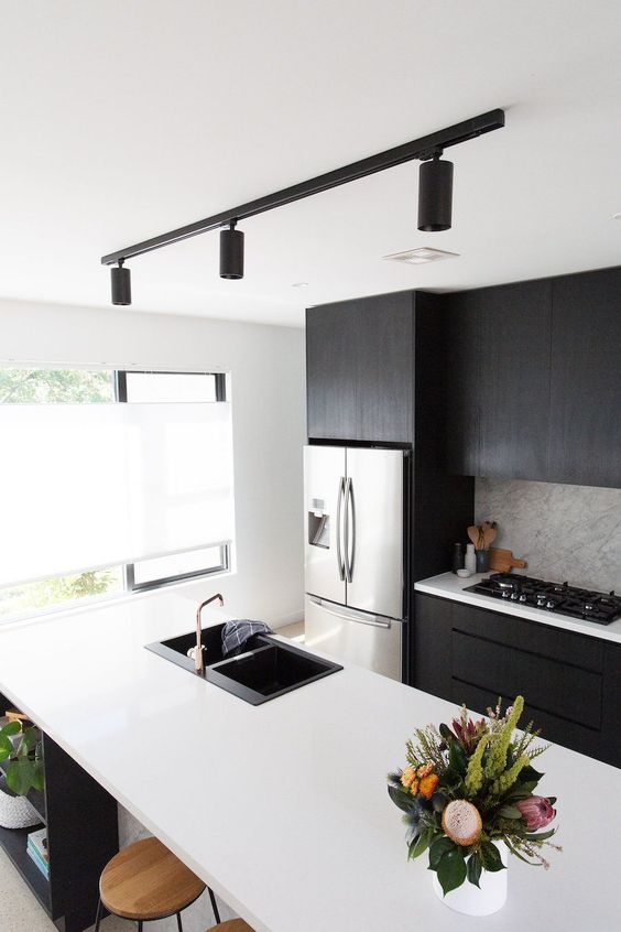 track lighting is a bold modern idea for any kitchen, it's very chic and very functional bringing much light