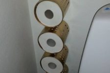 18 Ordning by IKEA used as toilet paper holders attached to the wall to save some space