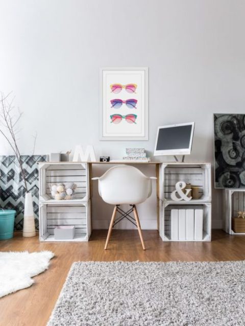 a cute and simple desk of whitewashed crates and a neutral tabletop for a relaxed space