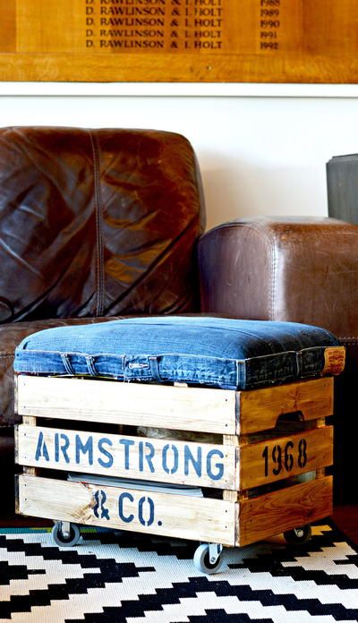 a crate denim ottoman on casters is a fun idea to add a rustic feel to the space