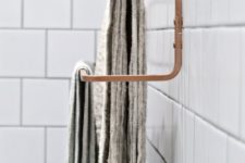 21 an Ikea Hjalmaren towel rail spray painted copper for a more chic look will fit a contemporayr bathroom