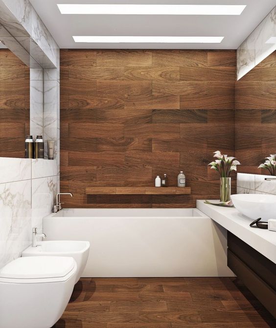 built-in lights over the tub won't take much space and look very sleek and elegant in this contemporary space