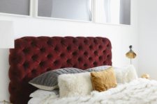 22 a tufted headboard upholstered in a deliciously deep red velvet is the ultimate luxury