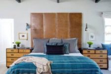 23 a tall brown leather headboard of several parts can be easily DIYed by you for your sleeping space
