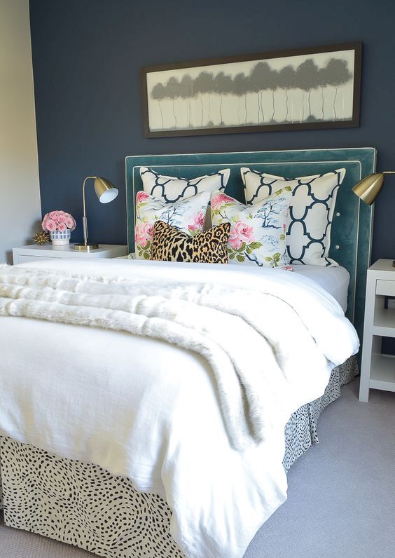 a teal headboard with framing and decorative nails is a touch of color for your glam bedroom