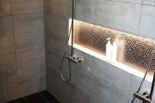 23 some built-in shower lights on the ceiling and a lit up niche for a cozy feel in the shower