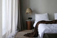 24 a bedroom with much texture – jute, wicker, various textiles and concrete walls and floors