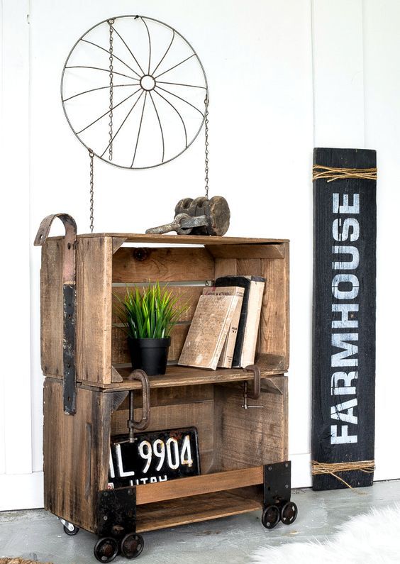 a stained coffee crate side table on casters with industrial detailing is a bold idea