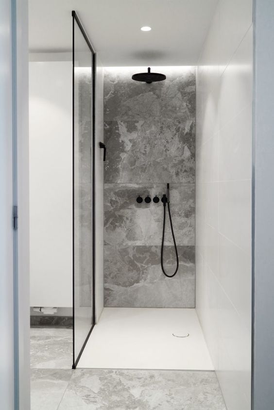 built-in LEDs and a light in the ceiling are enough to light up such a small shower space