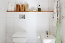 25 a bathroom spruced up with colorful tiles on the floor to make it catchier and cooler