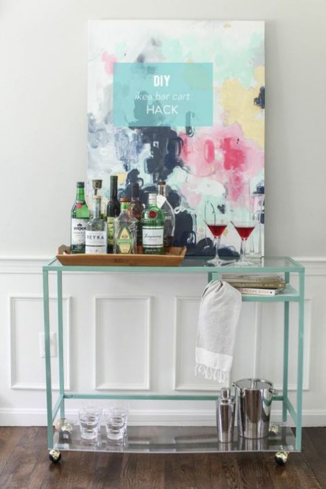an IKEA Vittsjo desk hack into a stylish and contemporary home bar that can be moved anywhere
