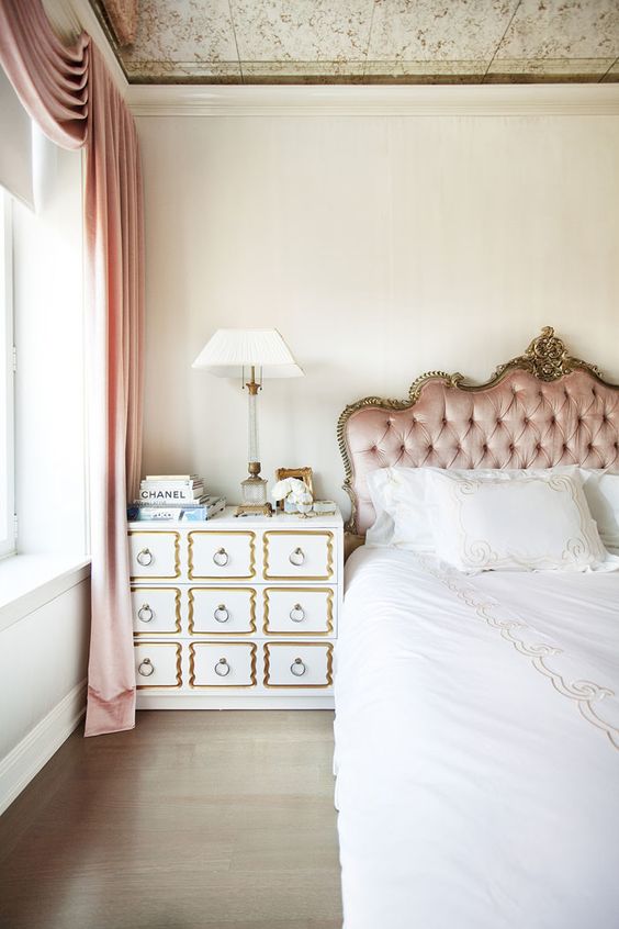 a refined and chic blush tufted headboard with framing is a chic idea for a luxury or glam bedroom