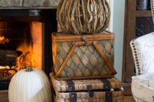 03 use the same wicker chests and baskets where you usually store towels and pillows for fall decor