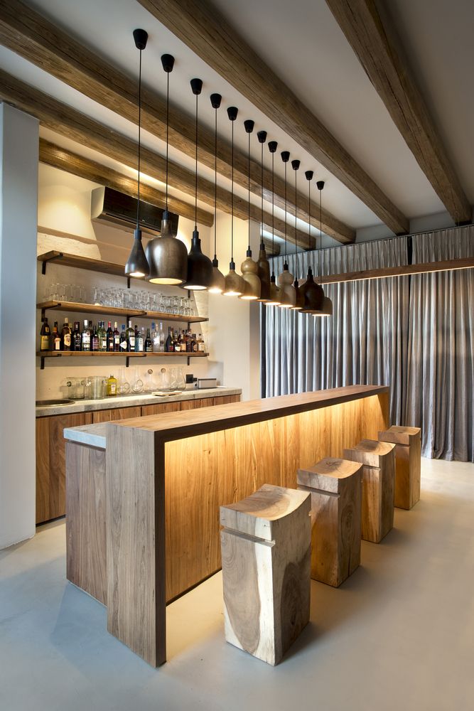 a stylish home bar design with interesting hidden lighting