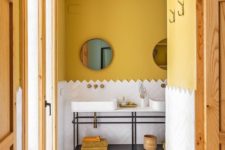 04 mustard paint brings a fall feel to the bathroom and makes it cool and fall-like