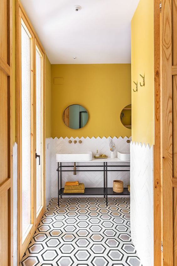 Mustard paint brings a fall feel to the bathroom and makes it cool and fall like