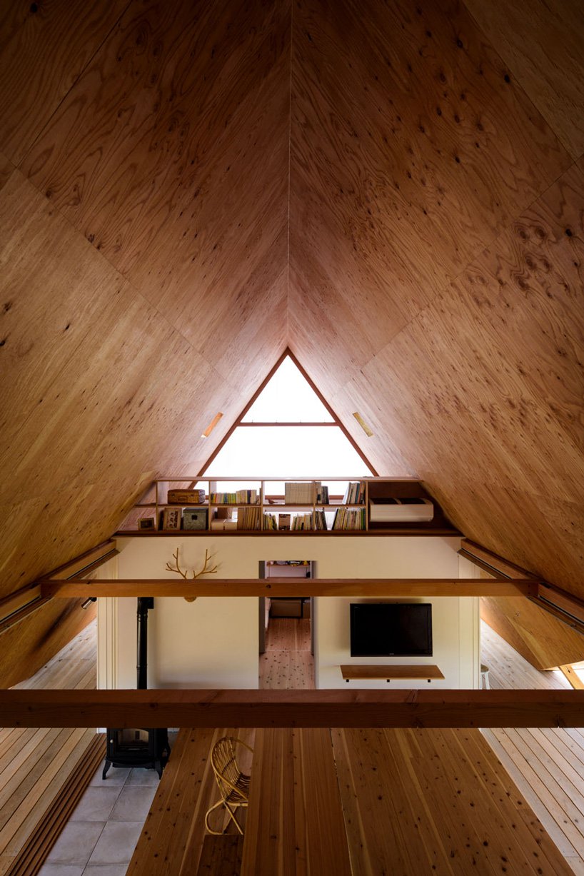 Large triangle glazed windows make the spaces filled with light