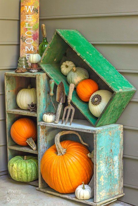 use old shabby chic crates to create a bold pumpkin display on your porch