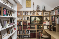 08 The study features endless bookshelves and a built-in desk plus some artworks