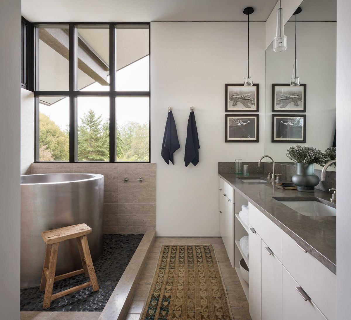 A soak tub is placed next to the window to enjoy the views