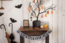 a halloween tree is a great centerpiece to any arrangement