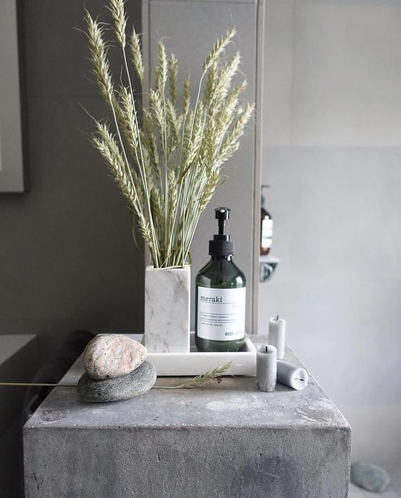 a wheat arrangement, some candles and pebbles will make your bathroom feel and look like a fall spa