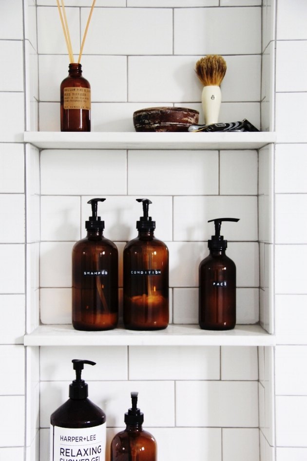 elegant and similar amber bottles for bathroom stuff is a cool idea to add color and elegance