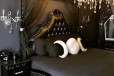 a moody bedroom design that works great during halloween season