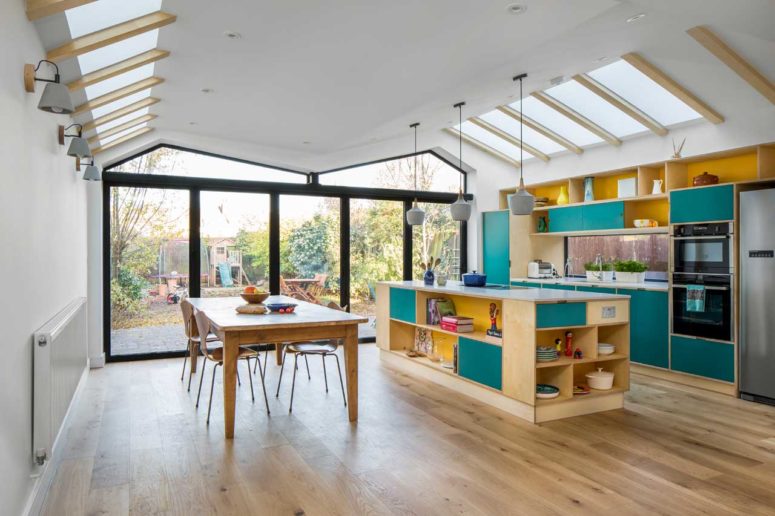 This contemporary home in London is colorful and bright, with bold furniture that was custom made for the project