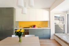 05 a neutral open space made bolder and brighter with a yellow backsplash, green and grey cabinets