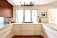 a neutral kitchen design with particle countertops