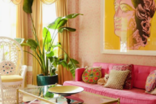 18 a colorful living room in yellow and hot pink, with a refined feel and chic gold touches for a sophisticated look