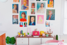 19 a colorful space done in orange and pink, with a bright and colorful gallery wall, which adds a whimsy touch to the space
