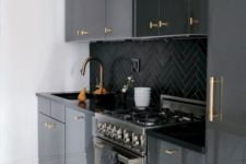 19 a modenr black kitchen refreshed with white surfaces and with gold handles all over that add a touch of glam