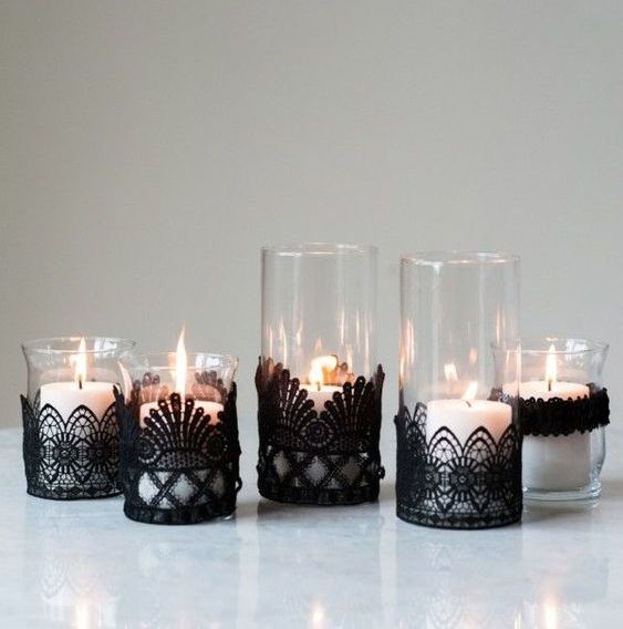 black lace candleholders are an elegant and chic craft for Halloween, they can be crafted in two minutes