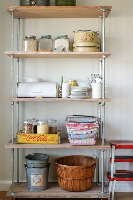 place a large industrial shelving unit in your kitchen to store everything you may need