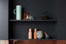 21 a stylish matte black kitchen made shiny with a cool copper tile backsplash that also adds warmth