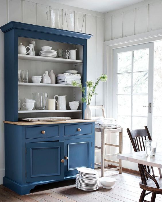 a stylish vintage-inspired blue buffet will add color to your space and make it cozier