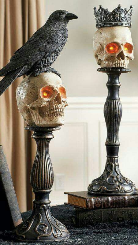 refined metal candleholders can be used as holders for skulls and other types of decor, too