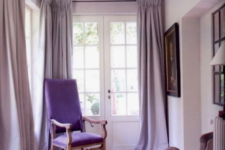 24 a sophisticated lilac space with a purple chair and elegant artworks will make any room refined and gorgeous