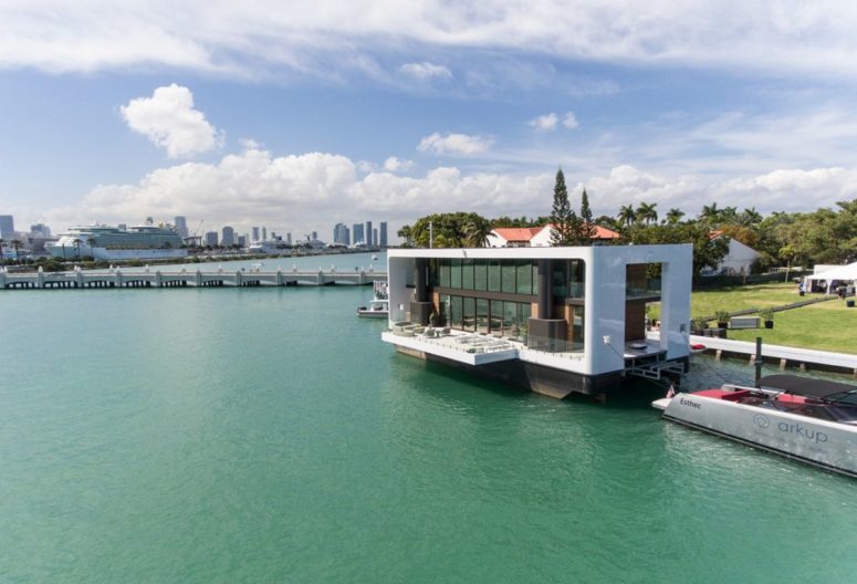 This is a cool contemporary floating house that is set on stabilizing tilts right on the water