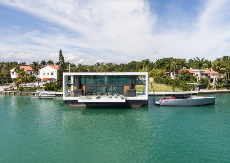 This is one-of-a-kind dwelling with a deck over the water and a chic contemporary design