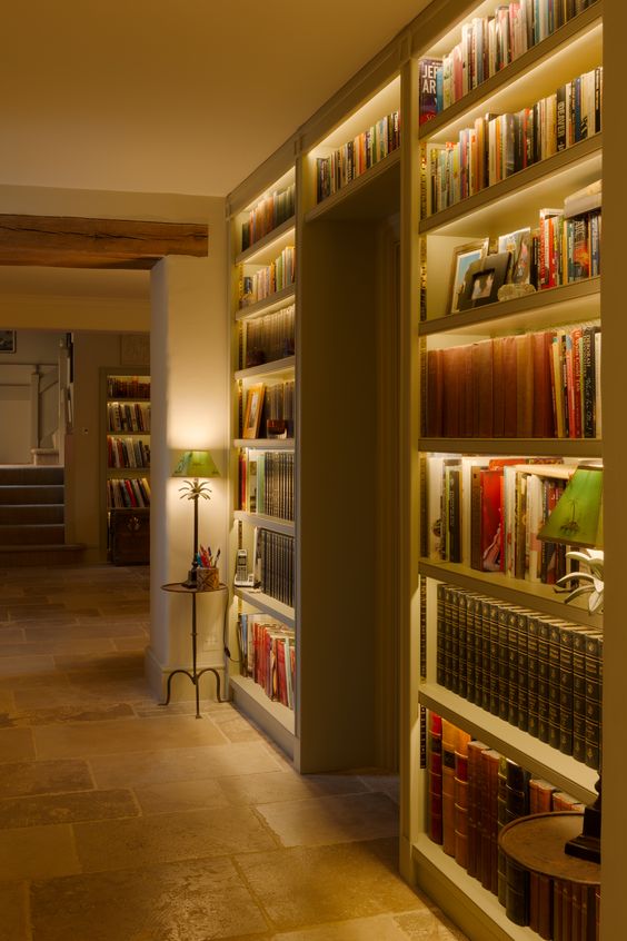 make your bookshelves stand out a lot with built-in lights like these ones and your space will also seem larger thanks to it
