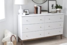 03 a simple IKEA pine dresser turned into a chic West Elm inspired piece will give you much storage space