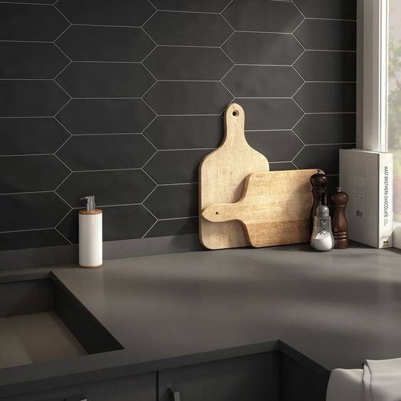 a black honeycomb tile backsplash with white grout is a creative idea that fits minimalist spaces