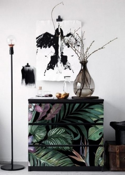 a simple Malm piece is updated using moody tropical contact paper looks very trendy