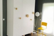 14 an IKEA Pax wardrobe hack with Muuto dots and Superfront legs looks very eye-catchy, whimsical and funny